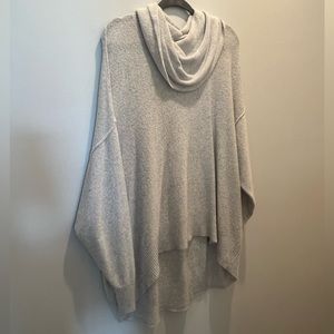 Cream, fuzzy, oversized American Eagle sweater.